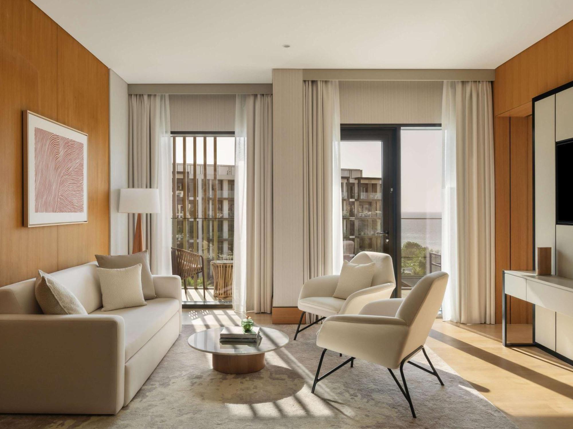 Delano Dubai At Bluewaters Hotel Exterior photo A living room at The Ritz-Carlton, Downtown, Dubai
